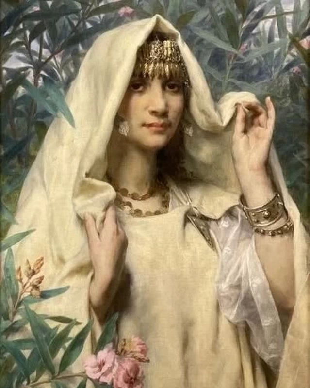 Giovane berbera in un giardino di oleandri